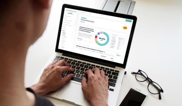 Laptop with Brand Performance website